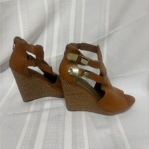 Brown wedge sandals with strappy design high wedge heel and soft suede material
